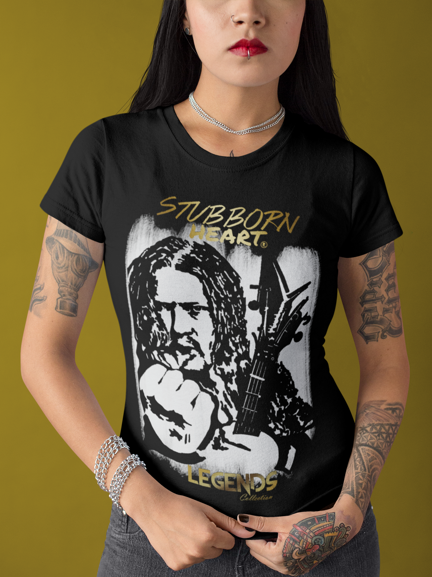 Goth tattooed female wearing a Pantera Dimebag Darrell Black T-shirt from the STUBBORN HEART Apparel store