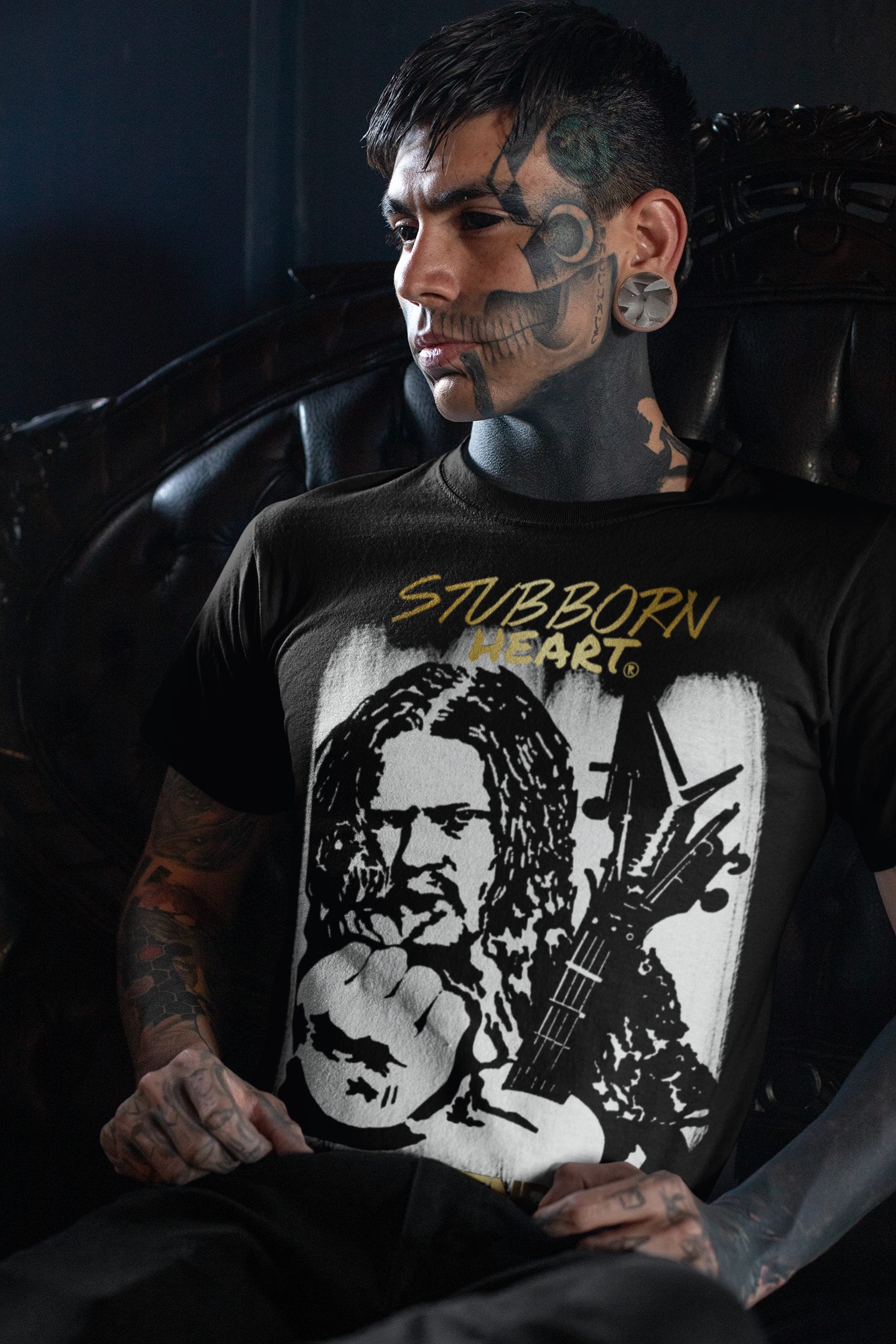 Goth tattooed male wearing a Pantera Dimebag Darrell Black T-shirt from the STUBBORN HEART Apparel store