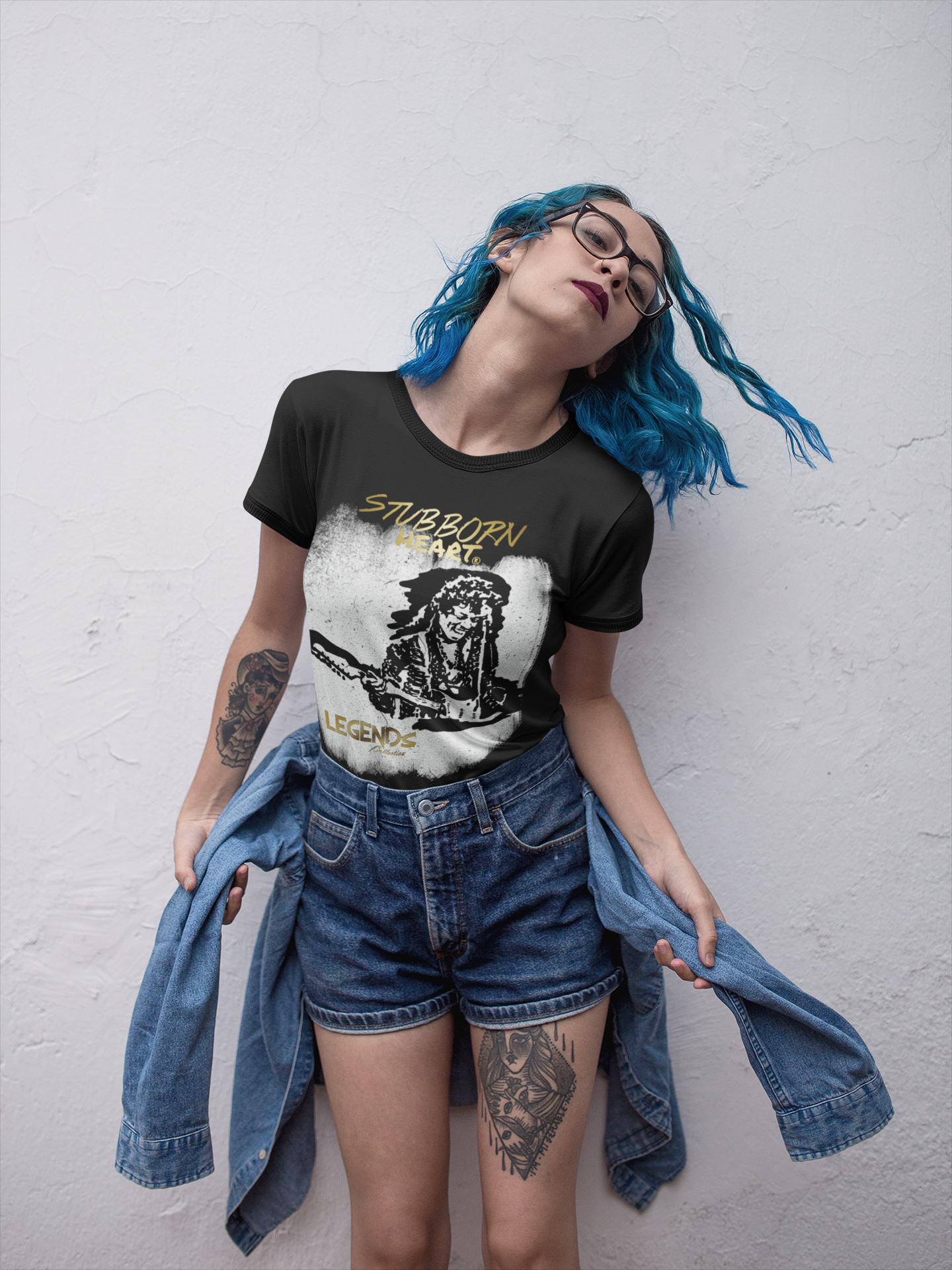 Pretty blue haired girl wearing a Jimi Hendrix Tee from the UK clothing brand STUBBORN HEART apparel