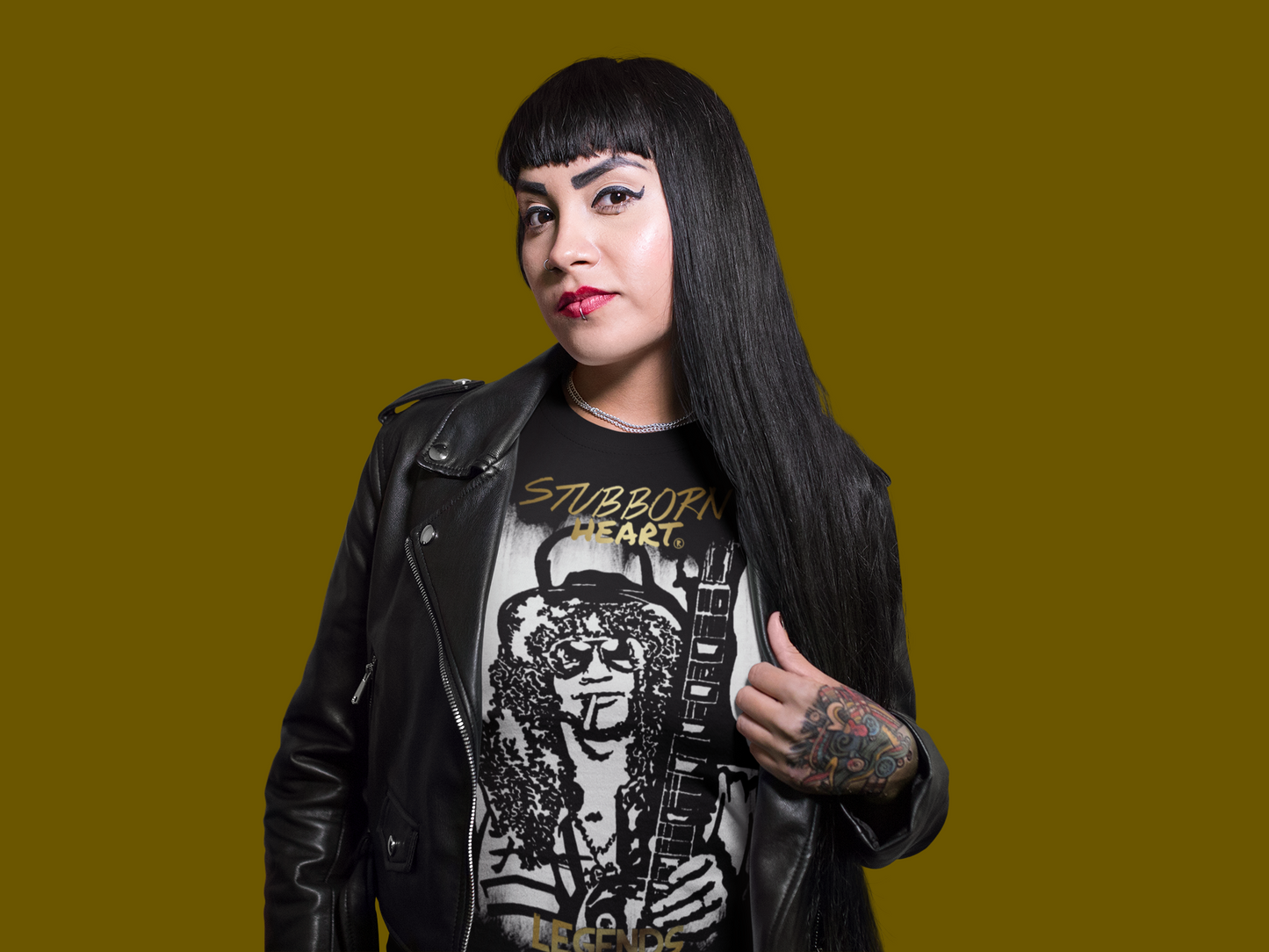 Female Metalhead with leather jacket wearing a LEGENDS COLLECTION Slash from Guns N Roses tee shirt from UK Alternative clothing store STUBBORN HEART Apparel