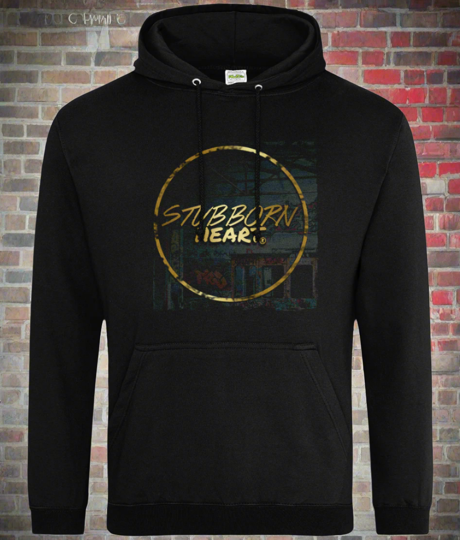 Black jumper hoodie with logo, skateboarding design on front from the UK Alt scene clothing brand STUBBORN HEART Apparel